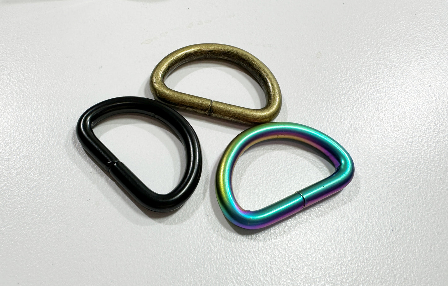 1" D Ring Matte Black, Matte Rainbow, Antique Brass Set of 4